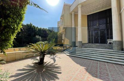 Villa - 5 Bedrooms - 6 Bathrooms for sale in Mena Garden City - Al Motamayez District - 6 October City - Giza